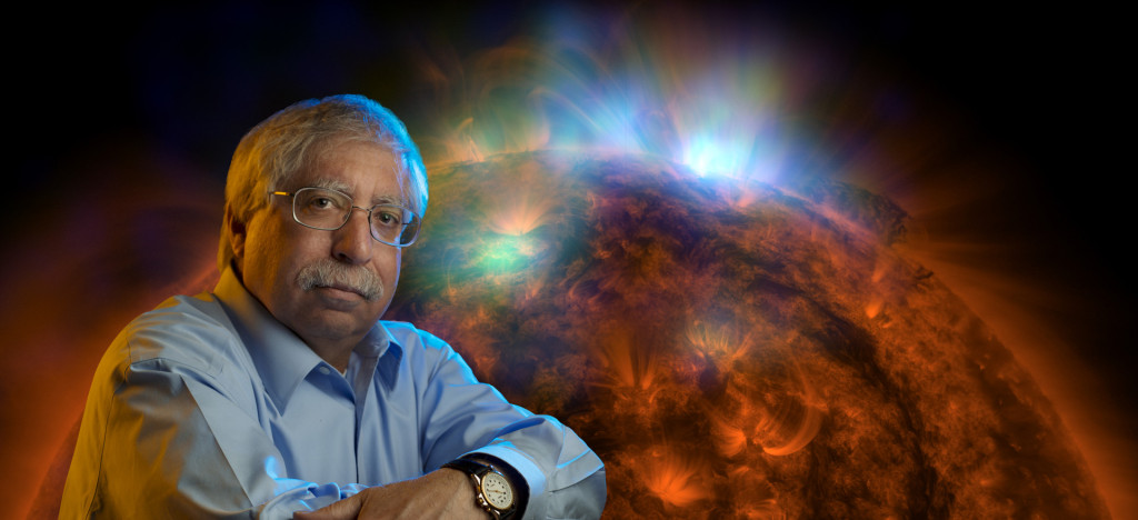 Professor Weil - CSU - NASA beside image of Solar Radiation